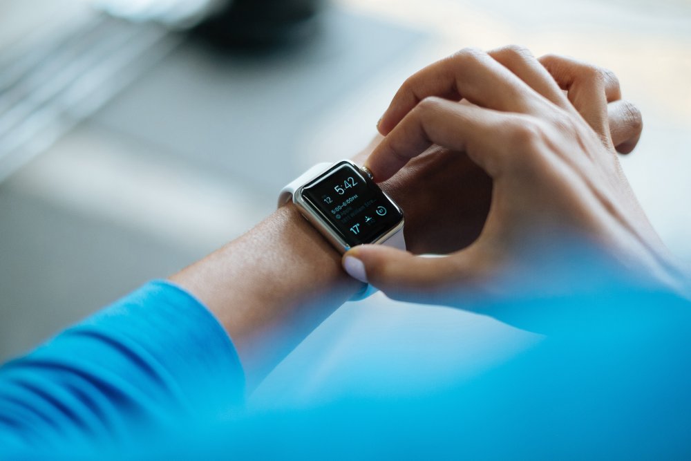 Man looking at smartwatch