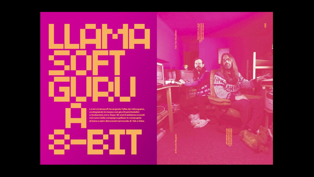 Wired Italia magazine spread shows a photo of two men at work, saturated with hot pink