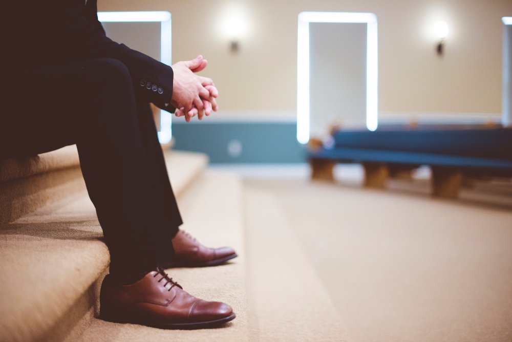 man sitting on step