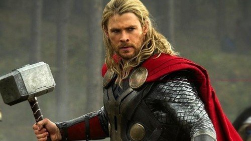 Thor holding his hammer and looking purposeful