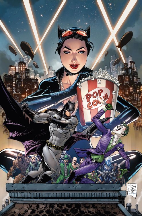 Catwoman feasts on pop corn as she watches Batman fight the Joker