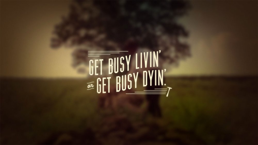 Blurred image of a tree with text overlaid saying 'Get busy livin' or get busy dyin''