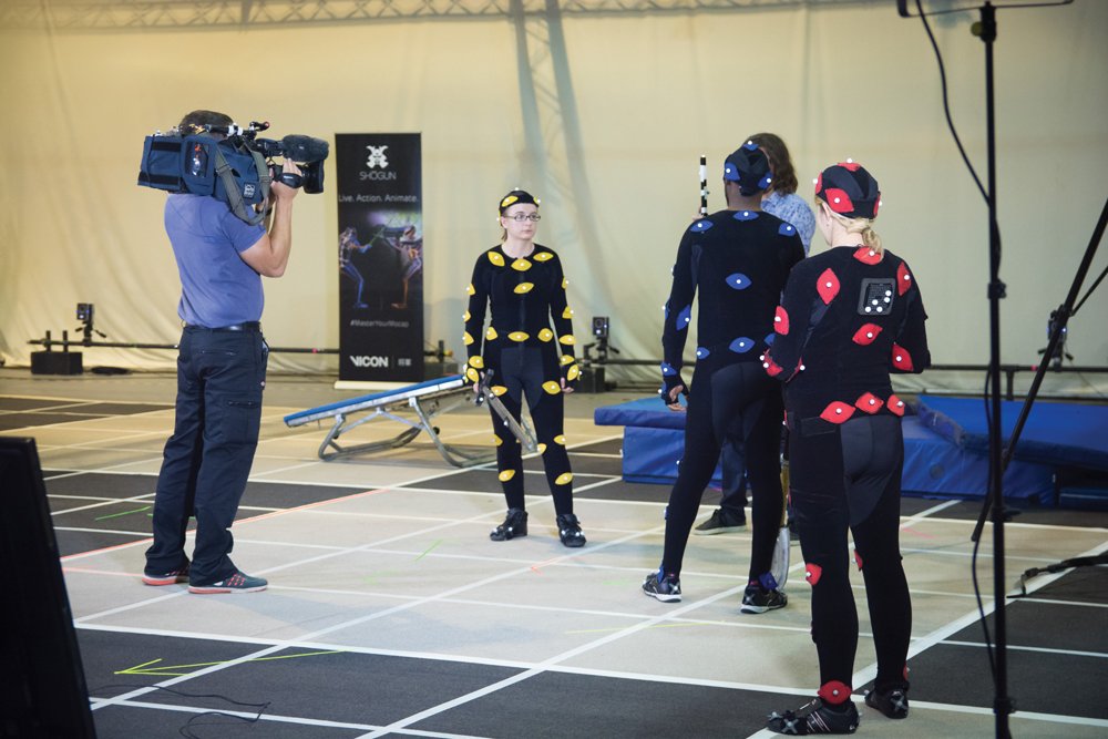 Actors work on a scene in Framestore's motion capture studio