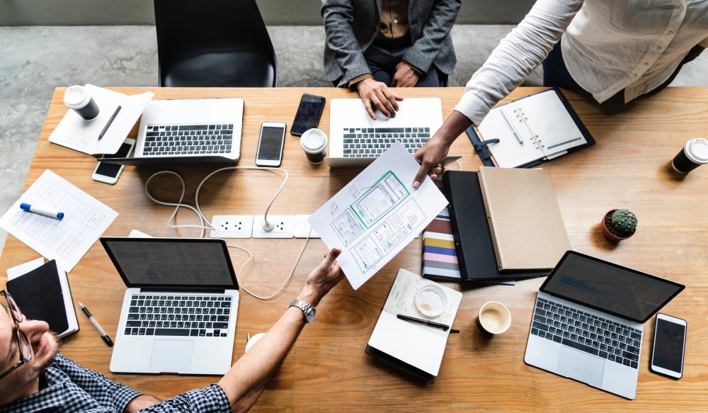 Four people in a meeting