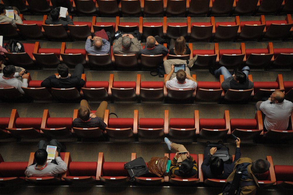Conference audience full of empty seats