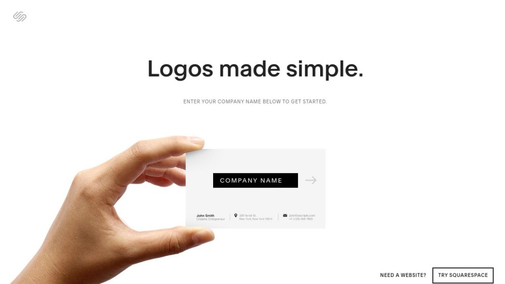 Best logo designer: hand holding a business card