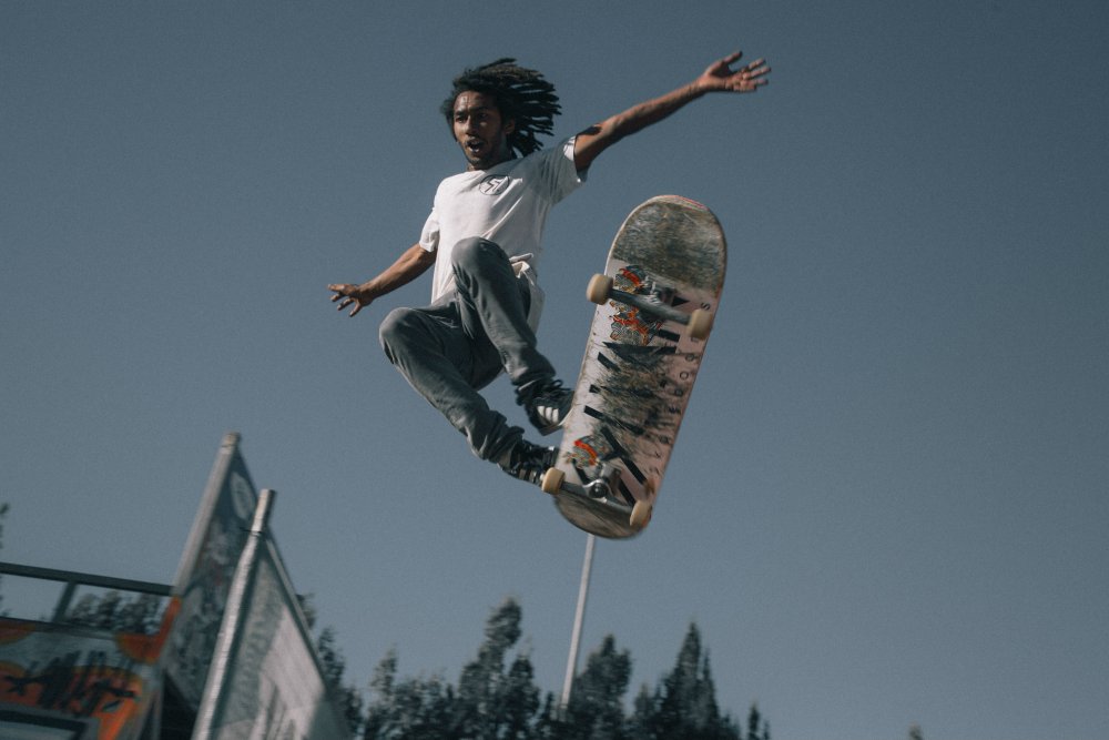 Man falling off skateboard