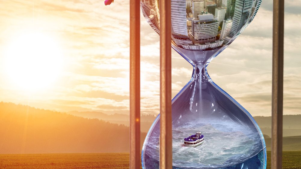 hourglass with scene in it and sunset