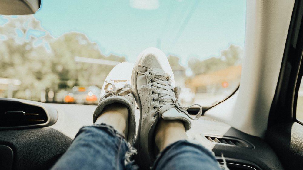 Feet up on dashboard