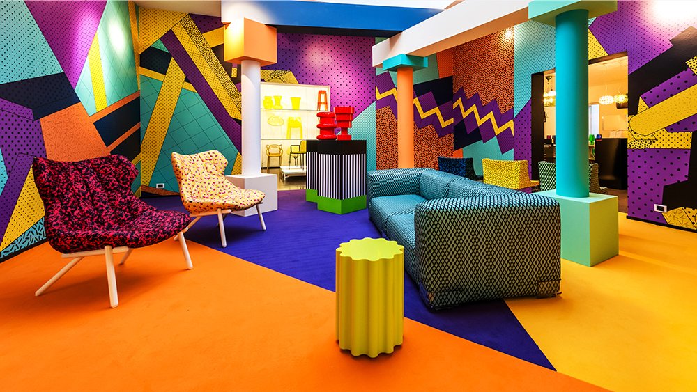 Karell store painted and carpeted in vibrant Memphis style, with Memphis chairs and furniture