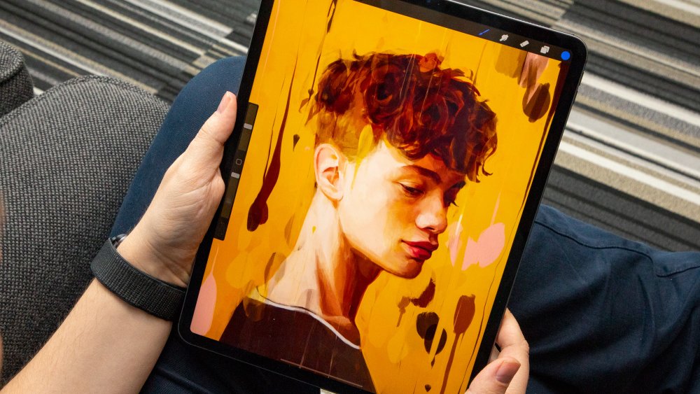 Person holding an iPad Pro 12.9