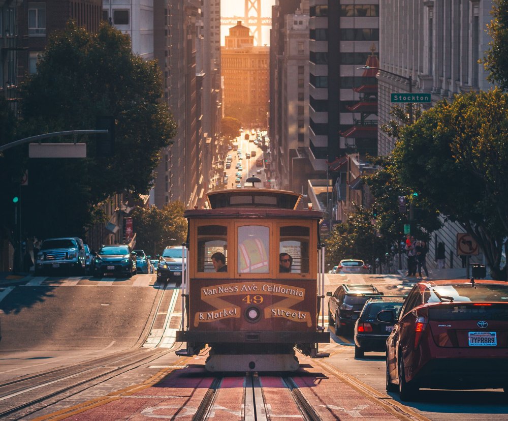 tram next to a row of taxis