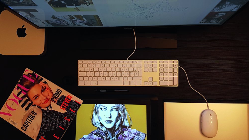 Desk with a Wacom tablet, Mac, copy of Vogue magazine