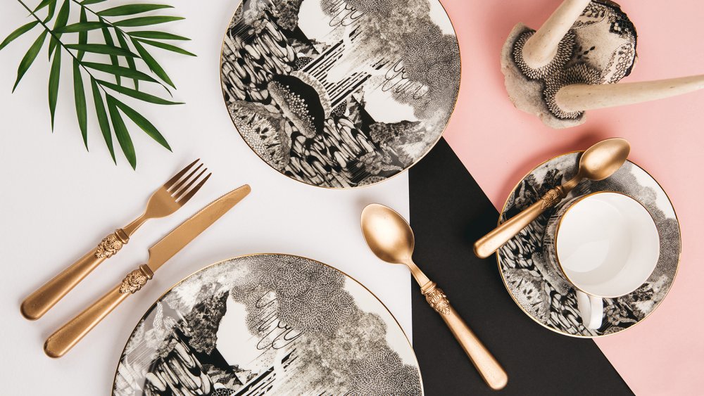 Plates decorated with whimsical landscapes