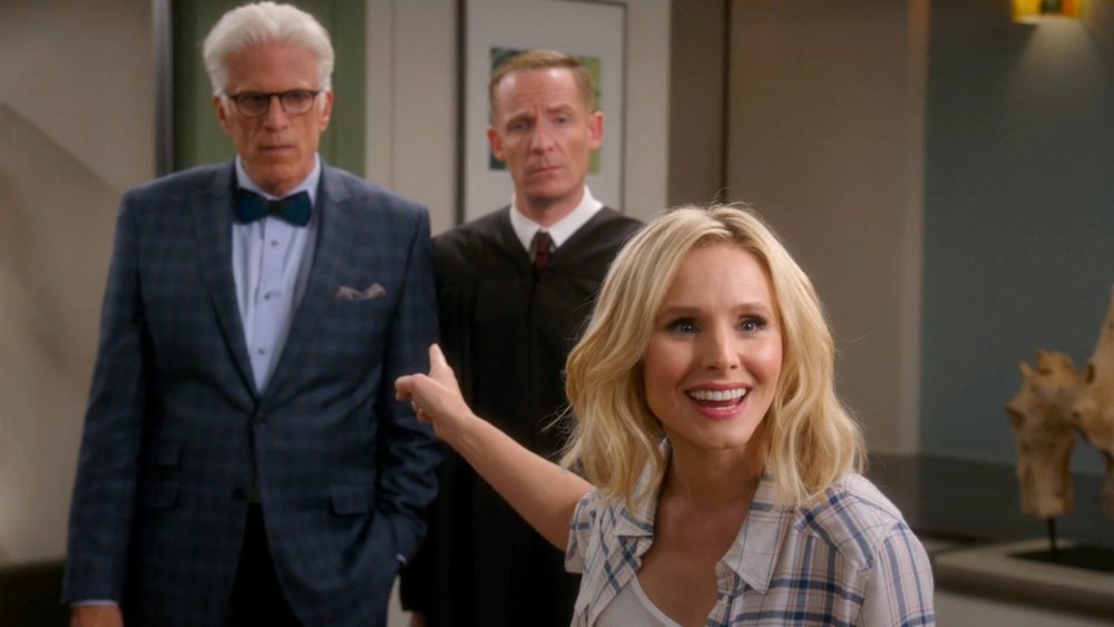 Kristen Bell points at Ted Danson