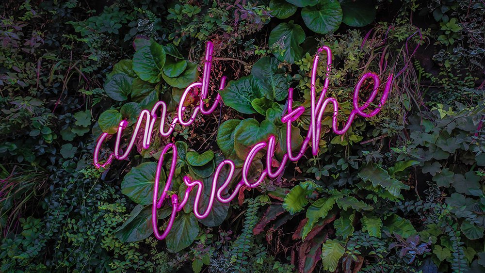 'And breathe' neon light