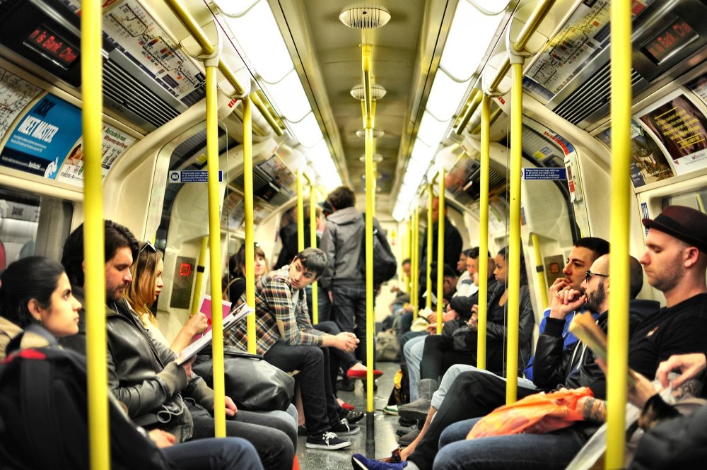 Passengers on a Tube train