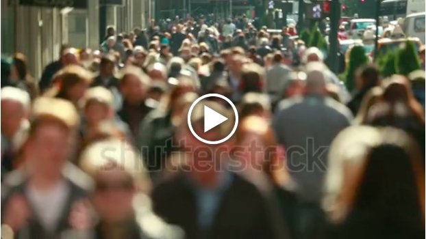 Large crowd of people walking