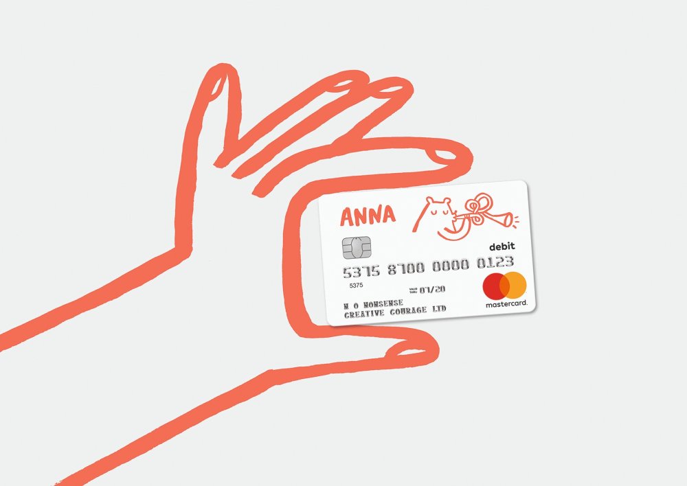 Drawn orange hand holding credit card