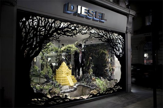 The temple window display and Diesel store front from outside